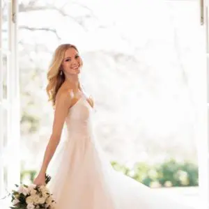 Martina Liana 1159 Wedding Dress Sample Sale - A Line dress with a whimsical layered skirt, a sweetheart neckline with v cut, and ruched bodice.