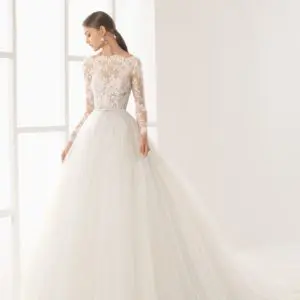 Rosa Clara Couture Niher Wedding Dress - Princess-style long-sleeved dress with transparent lace bodice, bateau neckline and full tulle skirt.