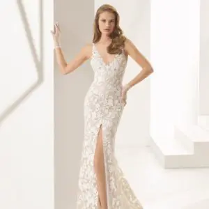 Rosa Clara Couture Panal Wedding Dress - Lace mermaid-style dress that features a low V-neckline, a wide slit in the front, and a low back.