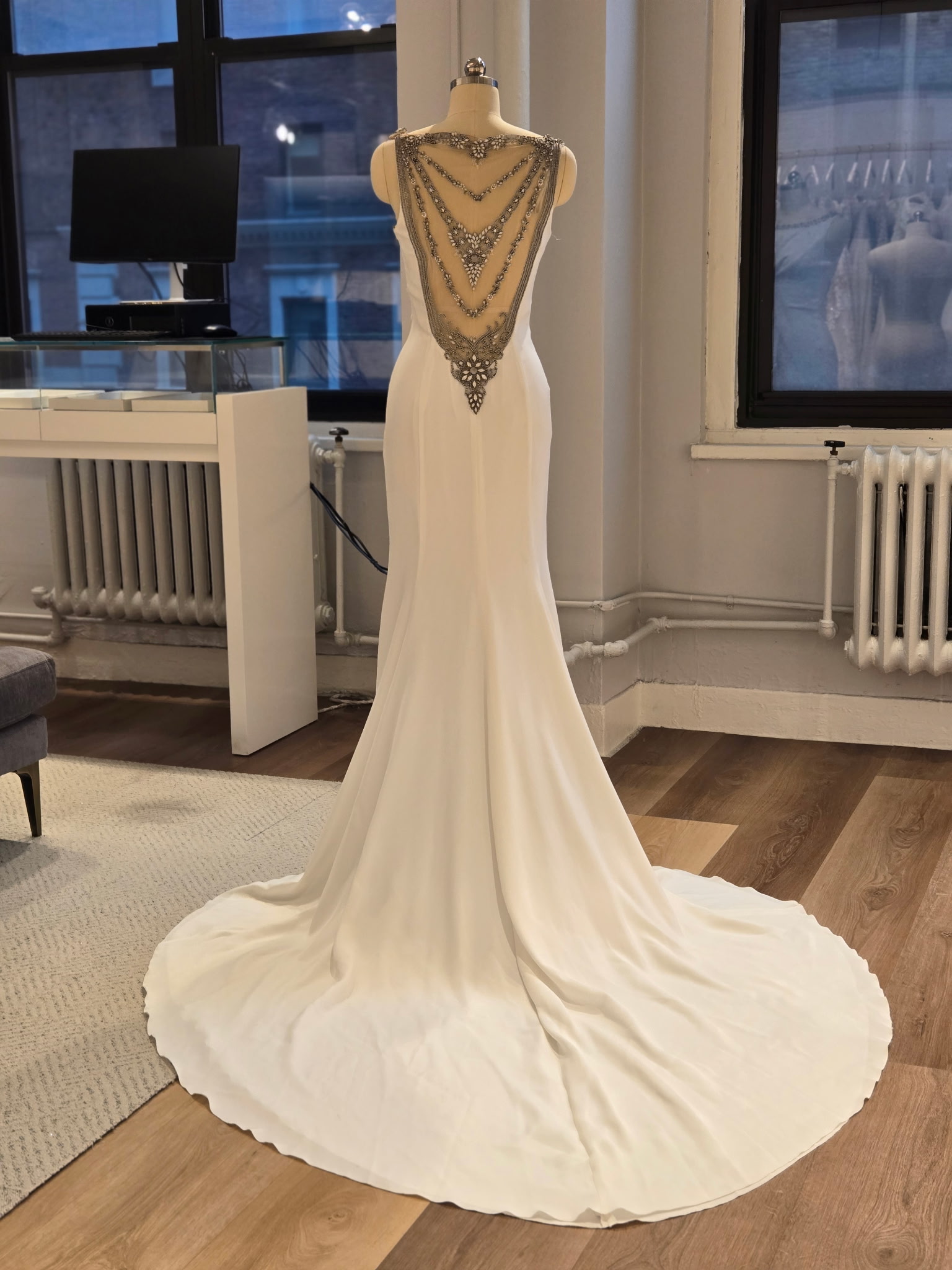 Rosa Clara Couture Naisha Wedding Dress Sample Sale - Classic Fit and Flare Bridal Gown with Princess Seams, Jewel Neck, Bling Detail and Crepe Fabric.