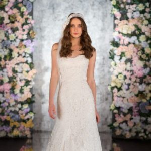 Martina Liana 561 Wedding Dress Sample Sale - Modified A-line wedding dress featuring beading and a scalloped lace edging along a strapless neckline.