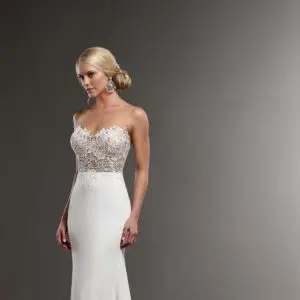 Martina Liana 775 Wedding Dress Sample Sale - Lace wedding dress featuring lace bodice and tulle giving the illusion of a strapless neckline and back. Crepe skirt and scalloped-lace pattern on train. Covered buttons Cover Image