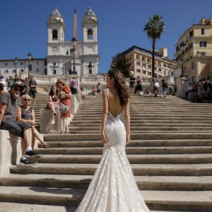 Birenzweig BRC8-10 Wedding Dress - Fit and Flair dress featuring foil lace with delicate floral thin straps and low back leads way to a dramatic train.