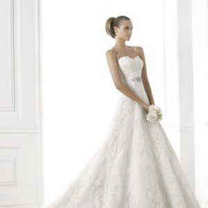 Pronovias Basma Wedding Dress Sample Sale - A-line dress with lace appliqué, delicate gemstone embroidery, sweetheart neckline, belt detail and train.