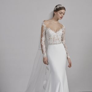 Pronovias Emy Wedding Dress Sample Sale - Mermaid skirt dress with a natural waist and a two-piece effect, Illusion long sleeves, and v-neckline.