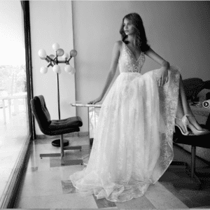 Flora Mila Wedding Dress Sample Sale - A-line style dress with a gorgeous V neckline, with a delicate lace skirt and beaded top. Cover