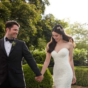 Martina Liana 909 Wedding Dress Sample Sale - Fit and flare dress with a sweetheart neckline and lace throughout plus a A-Line detachable over skirt.