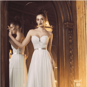 Paloma Blanca 4707 Wedding Dress - A Line skirt with strapless beaded lace corset bodice, plunging neckline, ribbon belt detail and lined cups.