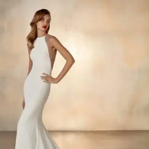 Pronovias Atelier Galaxy Wedding Dress Sample Sale - Fitted crepe sheath dress with a delicate beaded back, sexy side cuts, open back, and train.