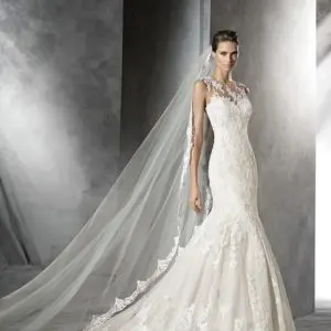 Pronovias Pladie Wedding Dress Sample Sale - Mermaid style dress with fitted bodice with an elegant sheer open back, an illusion neck and sweetheart cut.