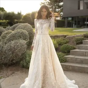 Pronovias Clio Wedding Dress Sample Sale - A-line featuring puffed shoulders along a bateau neckline, long sleeves, key hole back and stunning beaded belt.