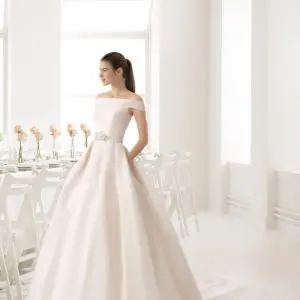Rosa Clara Collection Cedra Wedding Dress - Ballgown off-the-shoulder bateau neckline dress with pleats at the waist, belt detail and Gazar fabric.