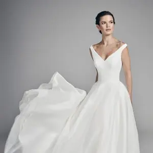 Suzanne Neville Amerie Wedding Dress - A Line off the-shoulder straps, v-neckline style with an organza skirt and a deep v-back neckline.