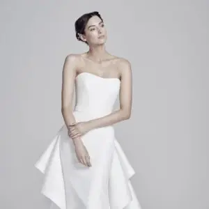 Suzanne Neville Mira Wedding Dress - Modified sweetheart neckline Italian crepe with sheath style skirt with optional detachable train and belt detail.