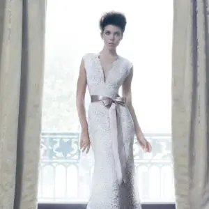 Suzanne Neville Radiance Wedding Dress Sample Sale - Fit and flare glamorous V-neckline, all French alencon lace fitted bodice with a ribbon detail.