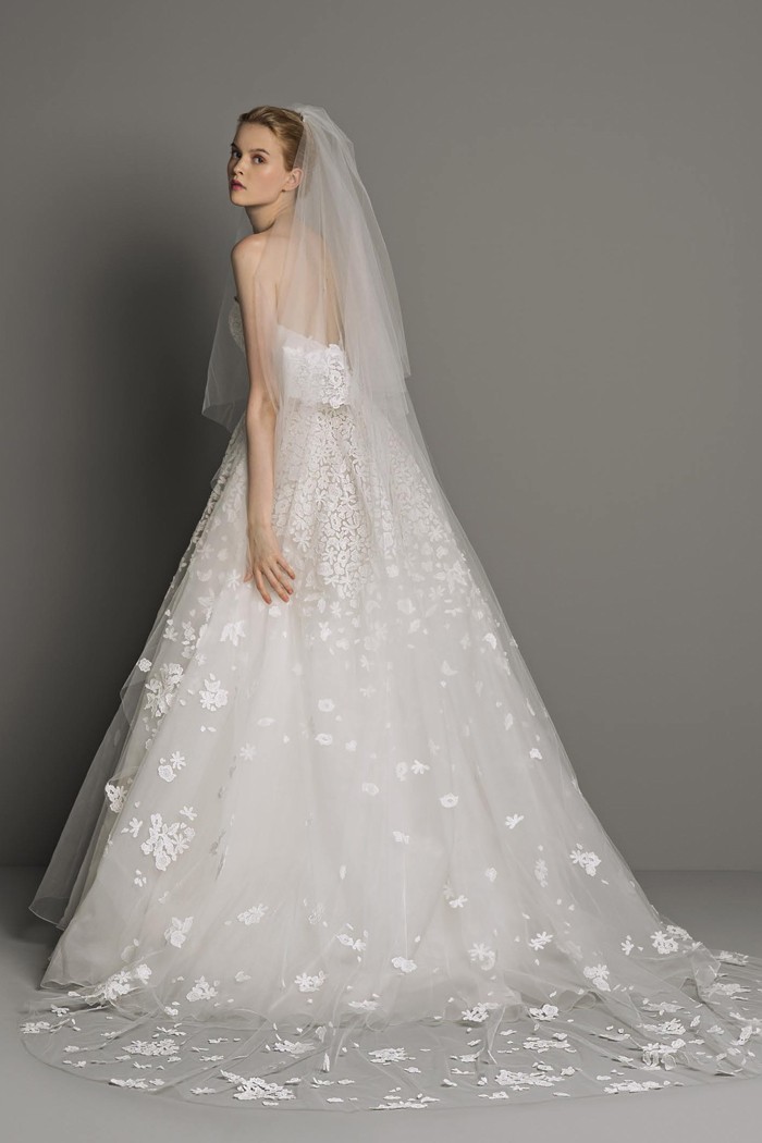 https://weddingatelier.com/wp-content/uploads/2021/01/boxslider_NADINE_and_matching_veil_V_1804_Peter_Langner.jpg