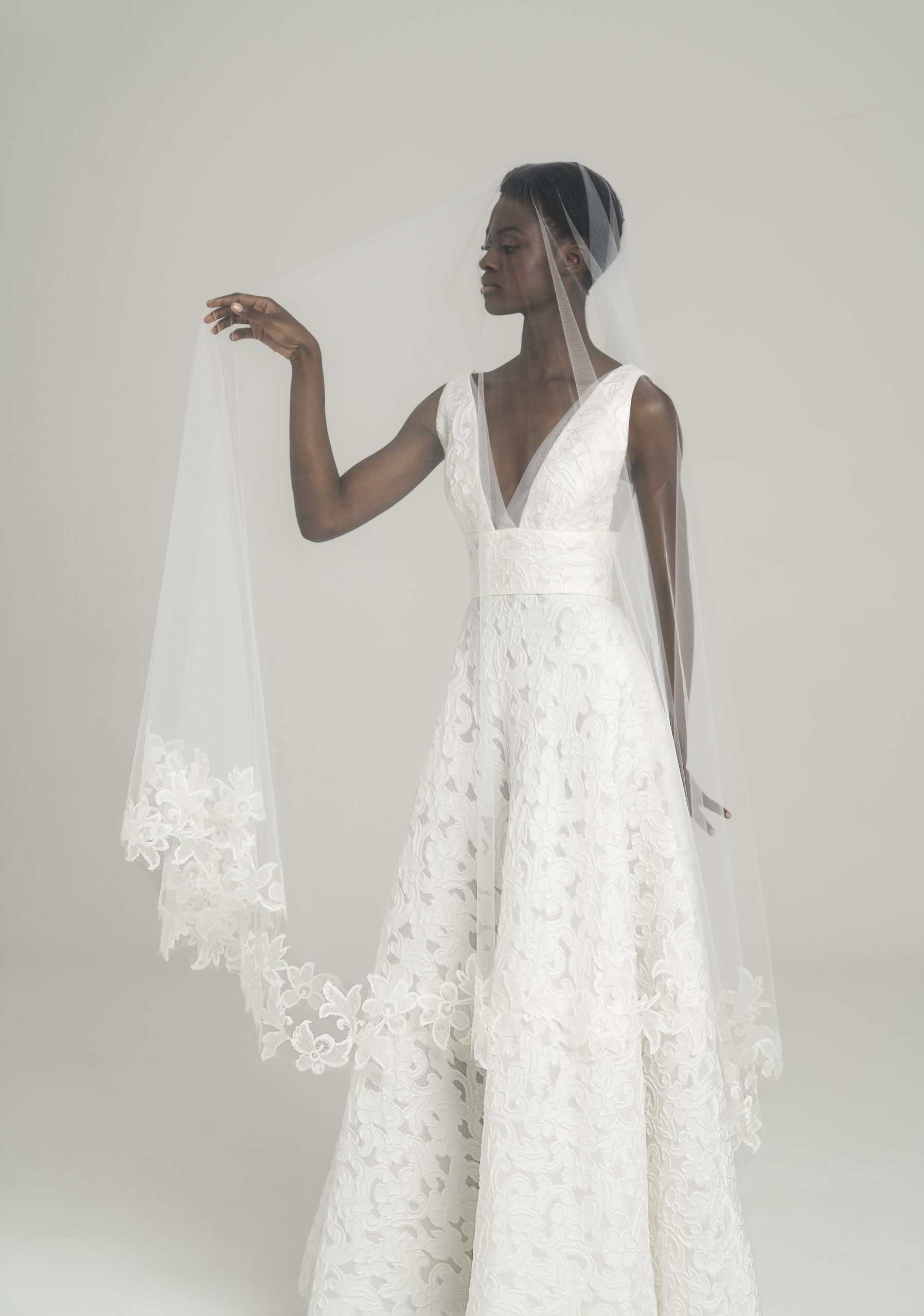 Peter Langner Chloe Wedding Dress - A Line style dress in silk jacquard with deep V neckline, Fitted bodice, sexy cut on sides and tulle details.