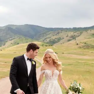 Martina Liana 1086 Wedding Dress Sample Sale - A line dress with structured sheer bodice with exposed boning, sweetheart neckline, and layered French lace.