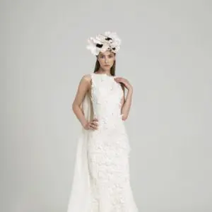 Peter Langner Sennadue Wedding Dress - Delicate lace fit and flare gown with deep open back, bateau high neckline and 3D floral appliqués.