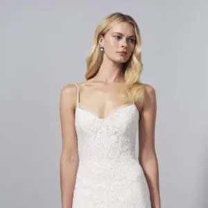 Allison Webb Bretton Wedding Dress - Fit and flare gown with Ivory French lace laid over Cashmere lining, spaghetti straps, and a low back.