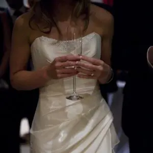 Suzanne Neville Peony Wedding Dress Sample Sale - Fit and flare style dress with a draped Bodice, modified Sweetheart neckline and beading detail on bust.