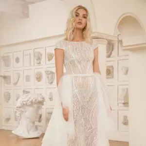 Dany Tabet Nessa Wedding Dress - Delicate sheath, translucent lightly beaded dress with round neckline, deep v back and cap sleeves.