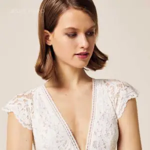 Jesus Peiro 962 Wedding Dress - Fit and Flair style dress with V neckline, delicate cap sleeves and, translucent lace back detail.