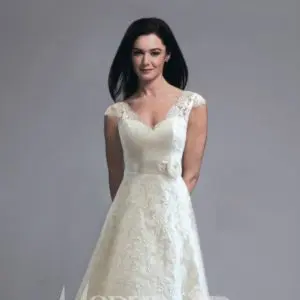 Modern Trousseau Honey Wedding Dress Sample Sale - Gorgeous A-line style dress with a V-neckline, delicate flowers details, classic lace overlay and satin belt.
