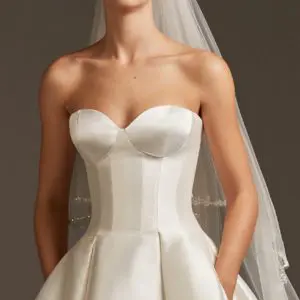Pronovias Pegasus Wedding Dress Sample Sale - Mikado ballgown with flattering corset bodice, strapless neckline, dropped waist, pleats on skirt and train.