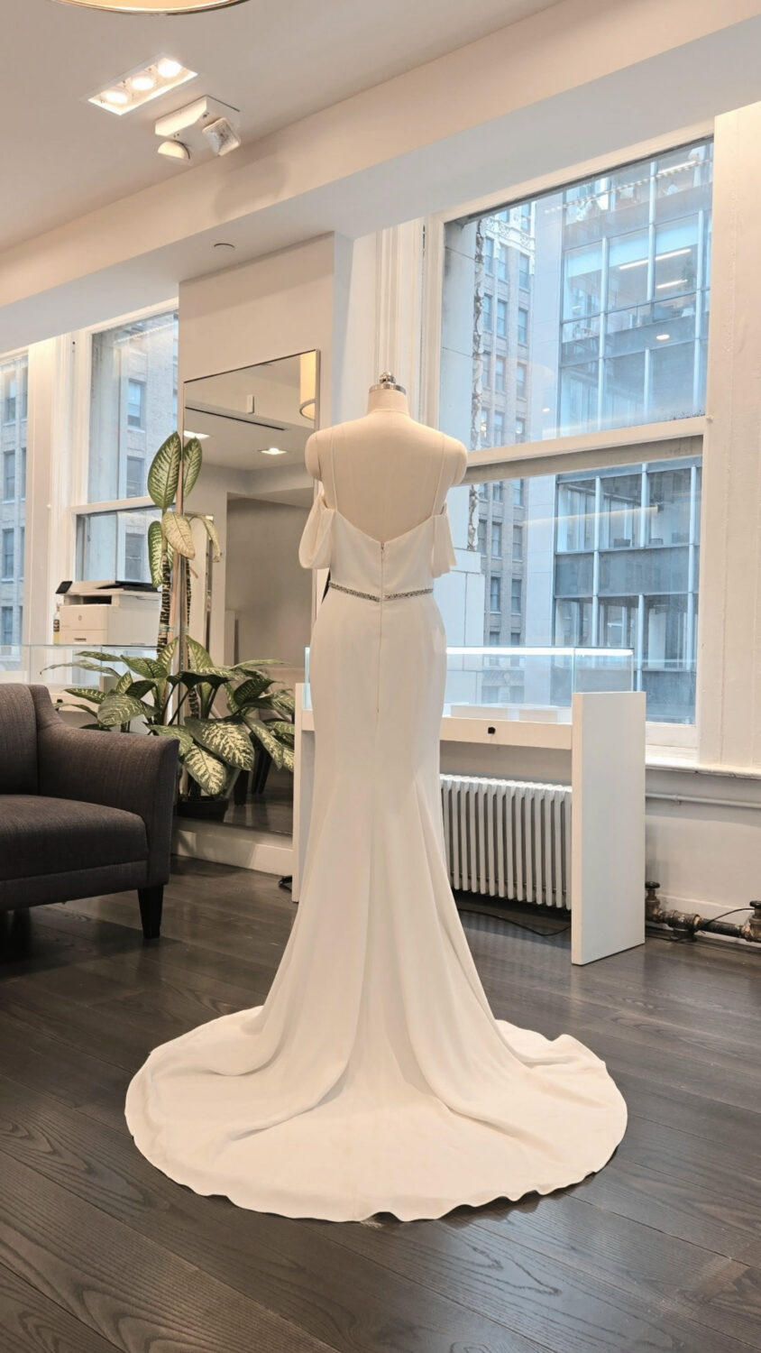 Paloma Blanca 4854 Wedding Dress Sample Sale - Fit and flare with modified sweetheart neckline, spaghetti straps, and draped sleeves. Includes beaded belt.