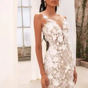 Dany Tabet Dondi Wedding Dress - Gorgeous fit and flare dress with delicate floral appliqués throughout. Illusion deep V - neckline with train.