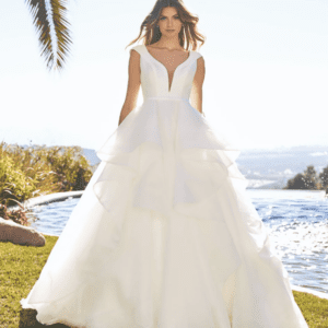 Pronovias Dominika Wedding Dress - A Line Layers of ruffles in organza, fitted bodice in mikado, deep sweetheart neckline, cap sleeves and scoop back. 