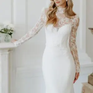Suzanne Neville Manoir Wedding Dress - Fit and flare dress with illusion French lace high neckline, fitted bodice, sweetheart neckline and long sleeves