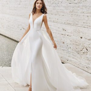 Rosa Clara Collection Nagash Wedding Dress - Crepe fabric, plunging neckline and open back, shoulder straps, side slit in skirt and detachable train.
