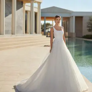Rosa Clara Collection Vincetta Wedding Dress - A-Line Princess silhouette with square neckline, open back, full skirt, lace around the hip and straps.