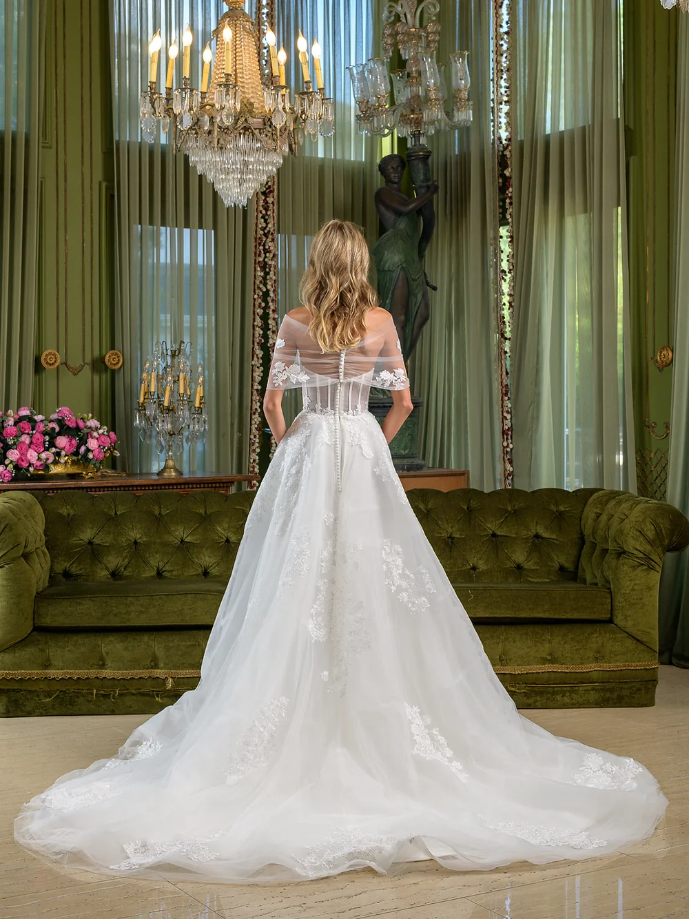 Estee Couture Dekota Wedding Dress - A Line with slim bodice, side pockets, off the shoulder details. sheered back with lace buttons and Cathedral train.