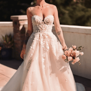Martina Liana 1483 Wedding Dress - A Line dress with strapless corset bodice, plunging neckline, floral lace embellishment, sheer bodice, glitter skirt.