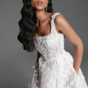 Dany Tabet Elizabeth Wedding Dress - Ballgown style dress with squared neckline, all-over 3D floral appliqués, open back, belt detail and train.