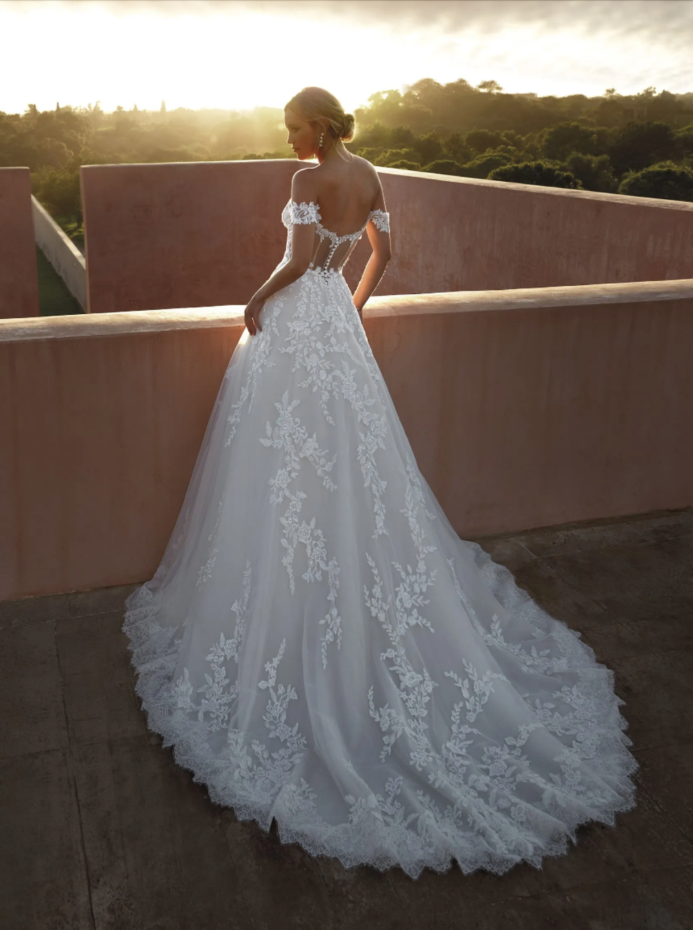 evaluate the bridal retail company pronovias on off-the-shoulder wedding dress CORIS | Princess wedding dress with off-the-shoulders neckline