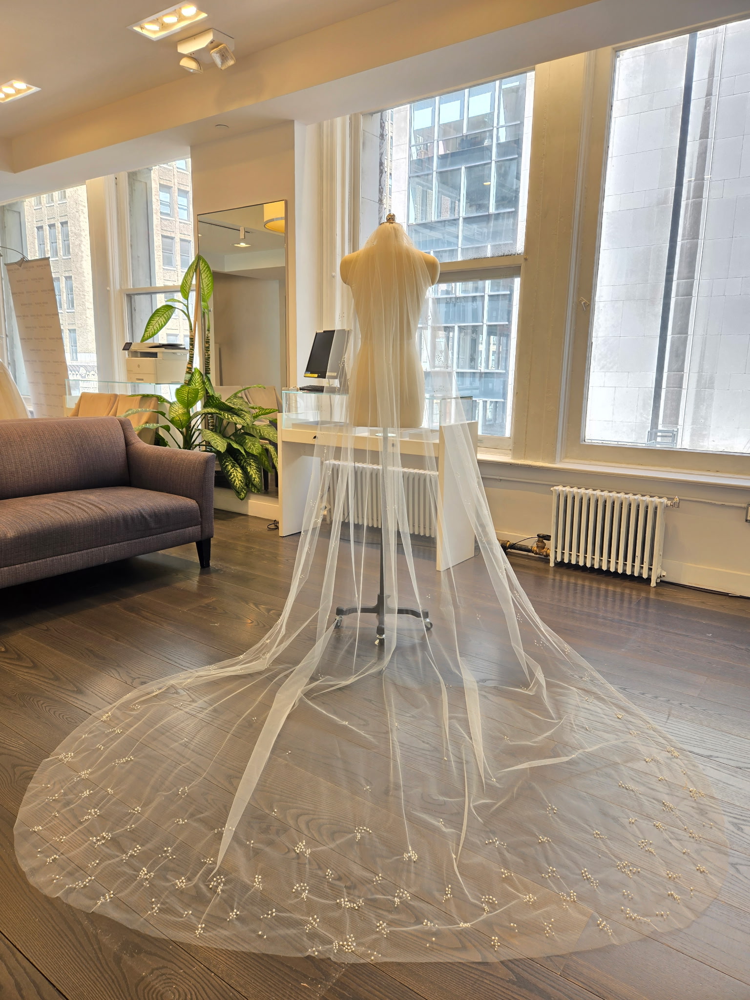 Peter Langner Ruby Wedding Veil - U shaped veil in tulle with no blusher, embroidered with groups of pearls and crystals.