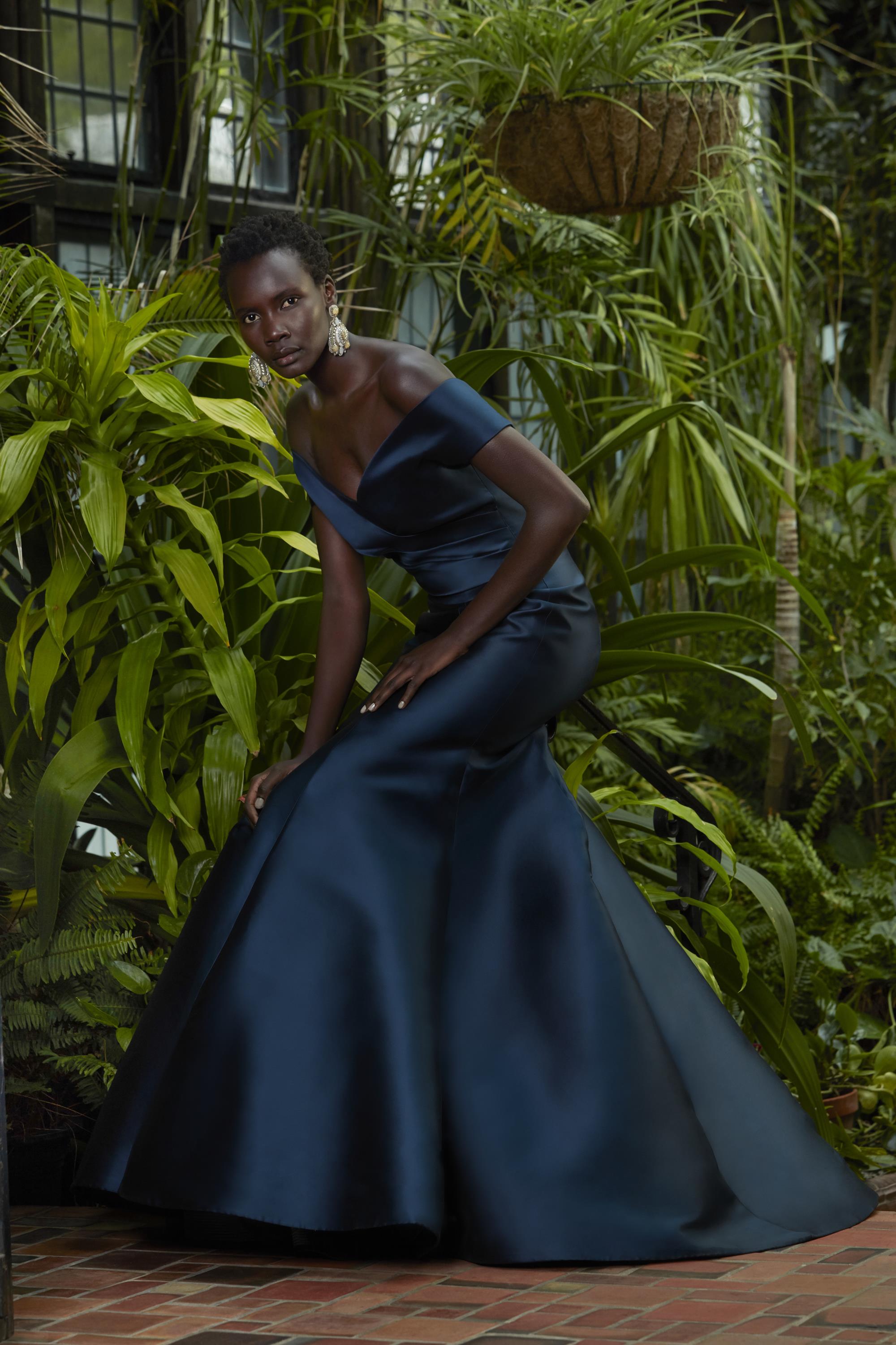 Sareh Nouri Grace Evening Dress - Fit and flare style dress with diagonal draped fitted bodice, Off-the-shoulder v neckline and cap-sleeves.