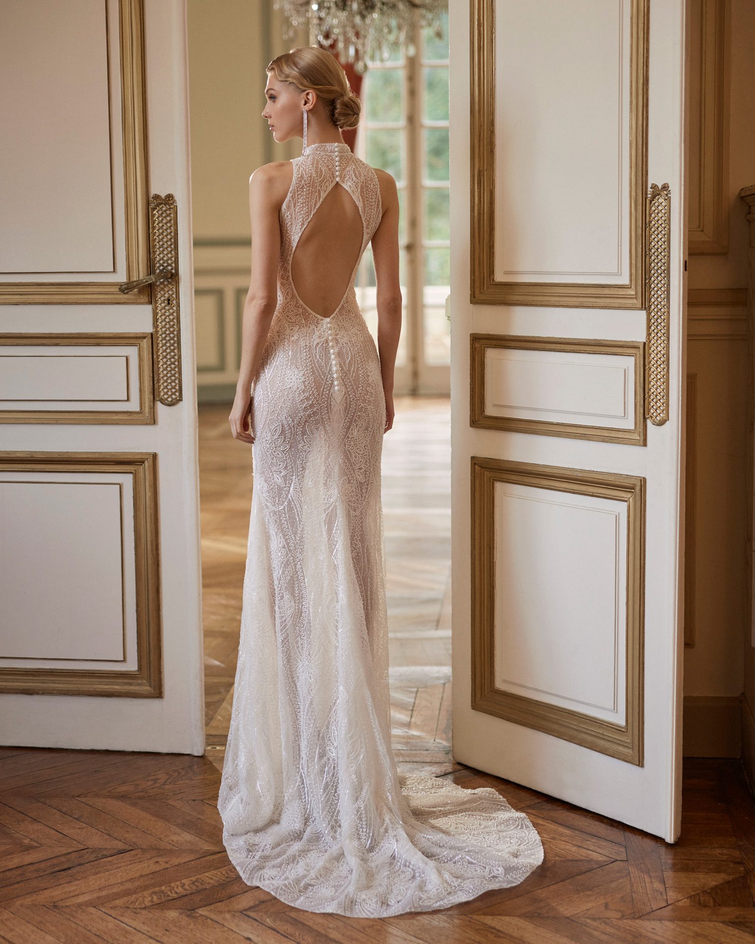 Rosa Clara Karlon Wedding Dress - Sexy mermaid wedding dress made in lace and beadwork. Featuring a halter neckline and open back.
