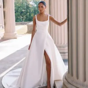 Sareh Nouri Philippa Wedding Dress - Italian Stretch Mikado scoop neck hand draped high slit ball gown with cathedral train and low back twist detail.