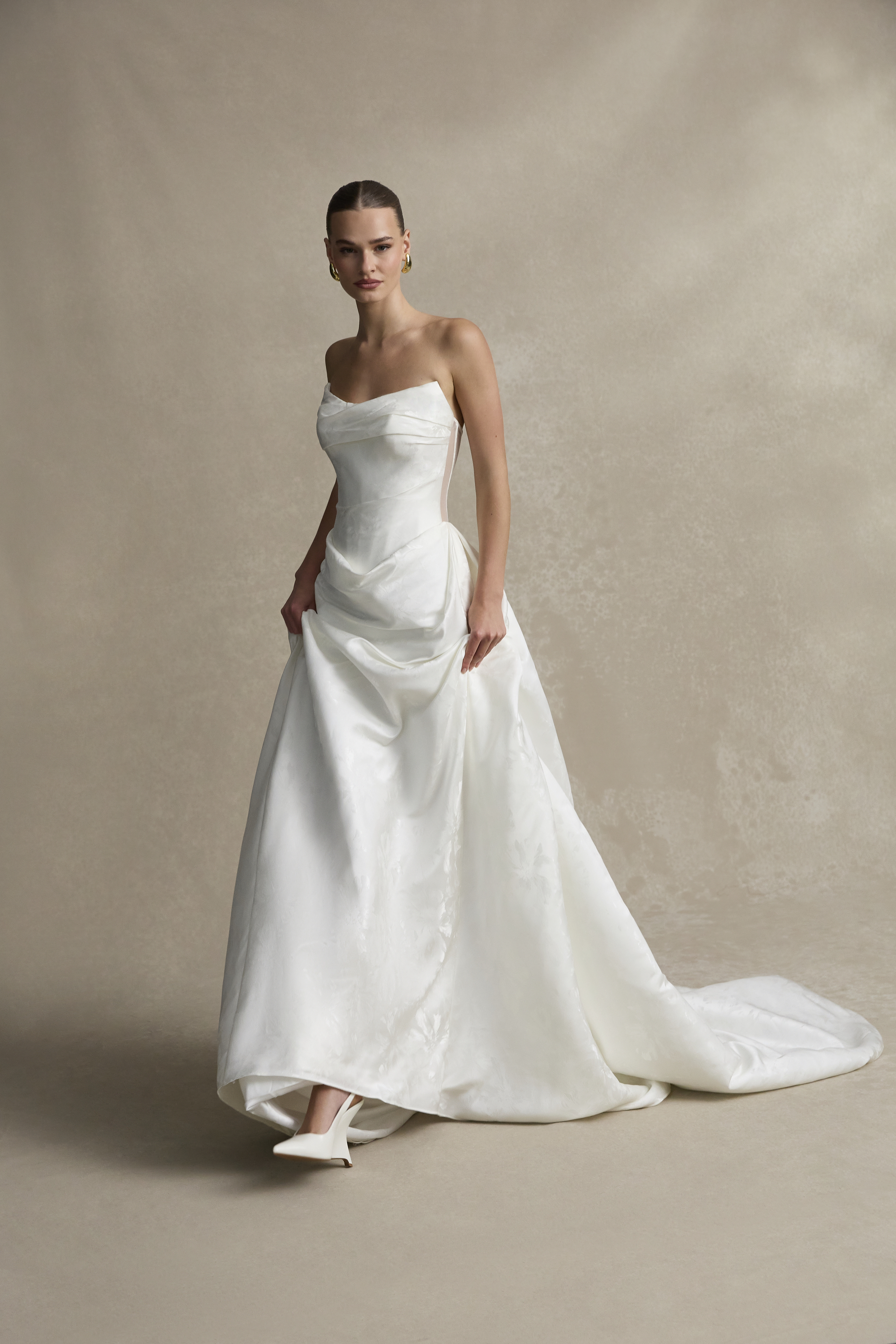 La Premiere Bridget Wedding Dress - Mermaid style dress with open back, exposed boning, classic jacquard fabric, strapless neck with illusion high neckline.