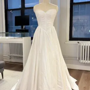 La Premiere Blake Wedding Dress - Classic Modern A-Line Bridal Gown with Basque Waist, Sweetheart Neckline, Cat-Eye, Detachable Sleeves, Pleated Detail and Taffeta Fabric.