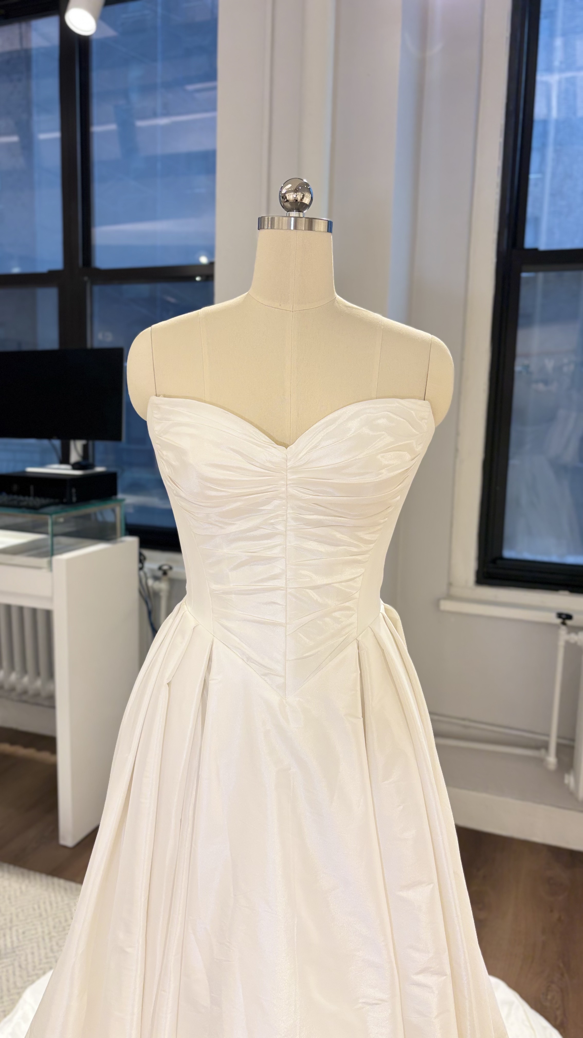 La Premiere Blake Wedding Dress - Classic Modern A-Line Bridal Gown with Basque Waist, Sweetheart Neckline, Cat-Eye, Detachable Sleeves, Pleated Detail and Taffeta Fabric.