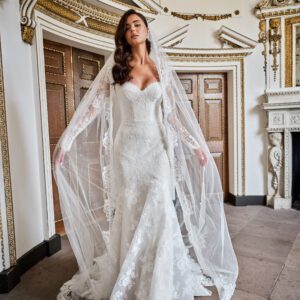 Suzanne Neville Solenne Wedding Dress - Timeless Classic Fit and Flare Bridal Gown with Natural Waist, Sweetheart Neckline, Long Sleeves, Train and Corset Detail and Lace Fabric