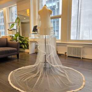 Peter Langner 1604 Wedding Veil - Oval Shaped Veil in Tulle Fabric with Silk Satin Lace Detail and Blusher.