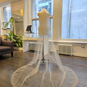 Peter Langner 6276 Wedding Veil – Oval Shaped Veil in Tulle Fabric with Beaded Details in Trim and Blusher.