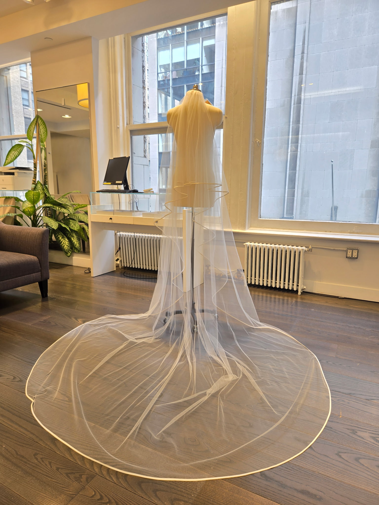 Peter Langner 1186 Wedding Veil - Oval Shaped Veil in Tulle Fabric with Silk Satin Ribon Detail and Blusher.